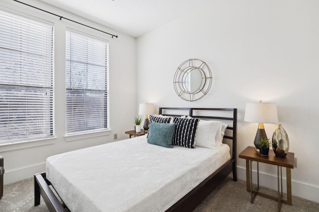 bedroom featuring baseboards