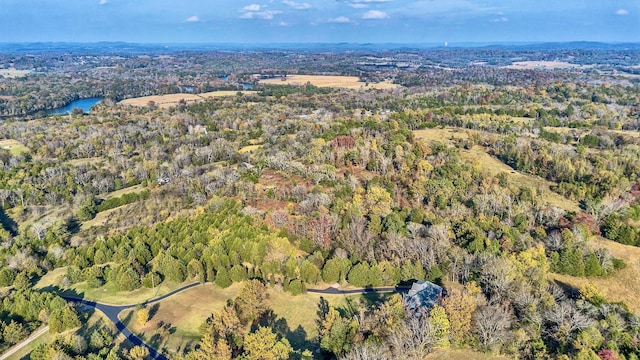 bird's eye view featuring a forest view