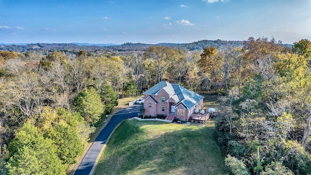 drone / aerial view with a forest view