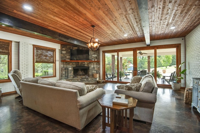 living room featuring a stone fireplace, wood ceiling, and concrete flooring