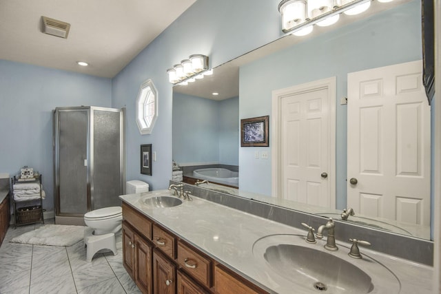 full bathroom featuring a shower stall, visible vents, and a sink