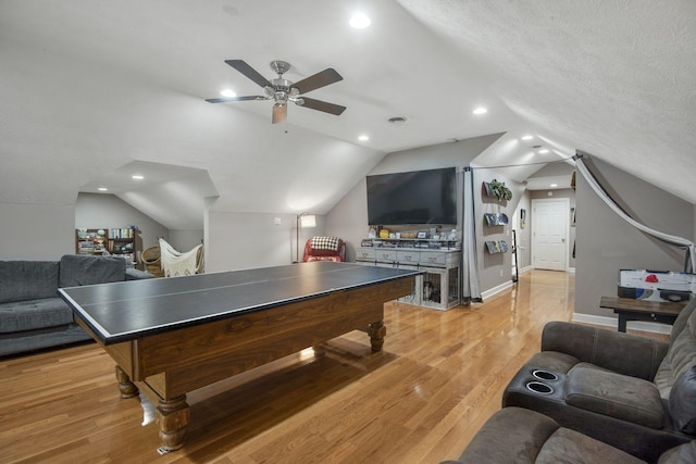 game room featuring lofted ceiling, light wood-style flooring, recessed lighting, baseboards, and ceiling fan