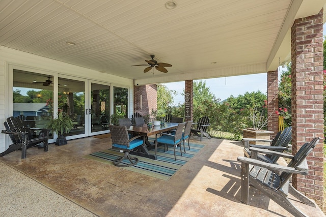 view of patio / terrace with french doors, outdoor dining area, and a ceiling fan