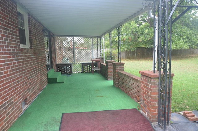 view of patio featuring fence