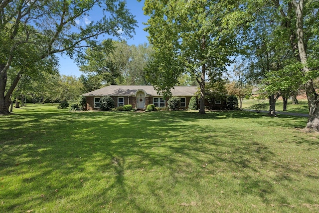 view of front of house with a front lawn