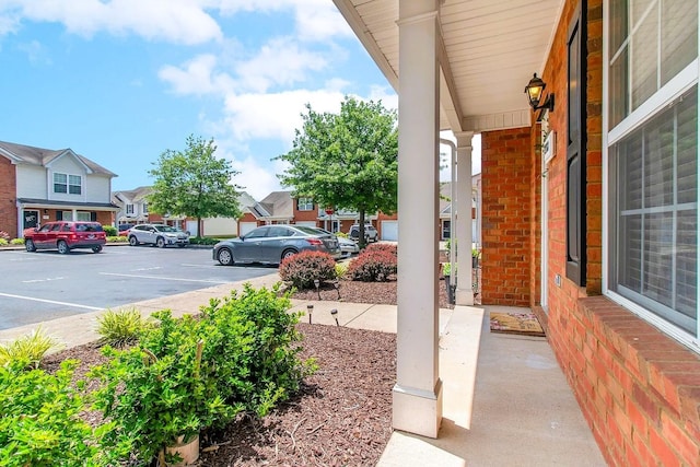 view of patio with a porch and a residential view