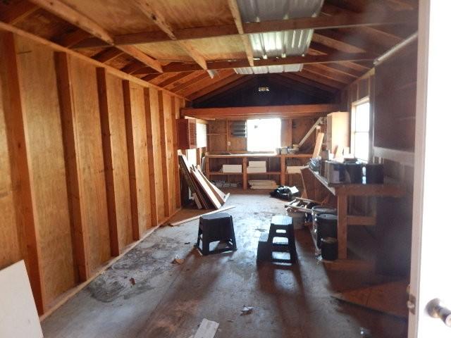 miscellaneous room featuring vaulted ceiling