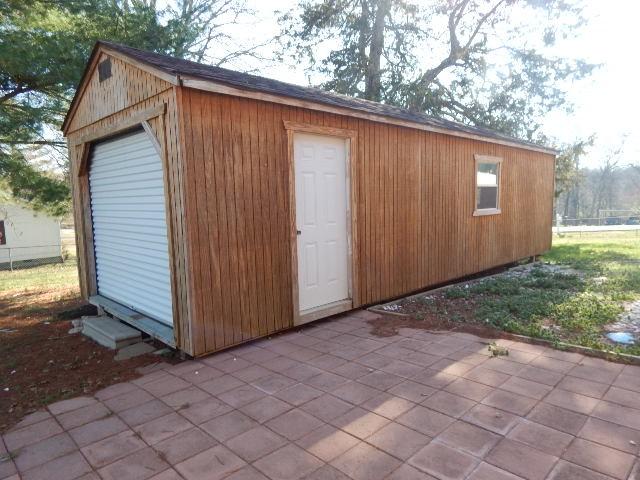 view of outbuilding featuring an outdoor structure