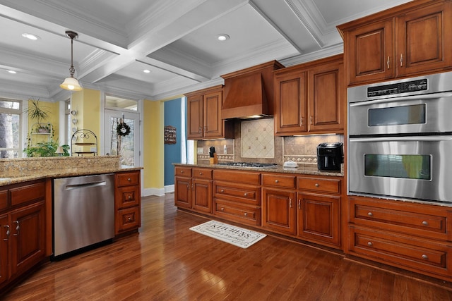 kitchen featuring dark wood-style flooring, beamed ceiling, appliances with stainless steel finishes, and premium range hood