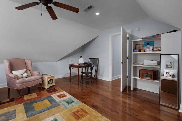 sitting room featuring visible vents, baseboards, ceiling fan, lofted ceiling, and wood finished floors