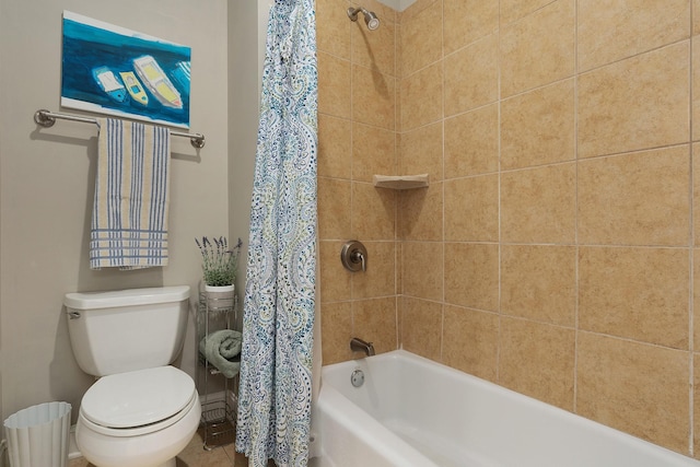 full bath featuring shower / bath combo with shower curtain and toilet