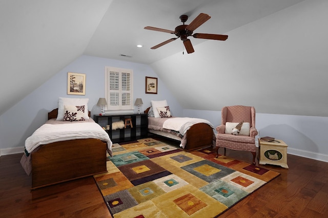 bedroom featuring visible vents, a ceiling fan, wood finished floors, baseboards, and vaulted ceiling