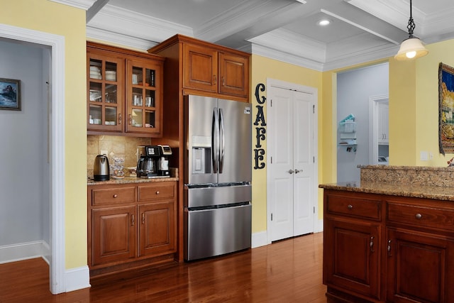 kitchen featuring stainless steel fridge with ice dispenser, ornamental molding, dark wood-type flooring, glass insert cabinets, and backsplash