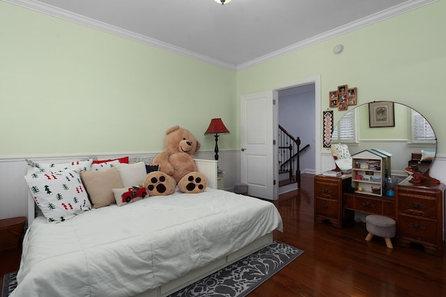 bedroom featuring crown molding and wood-type flooring