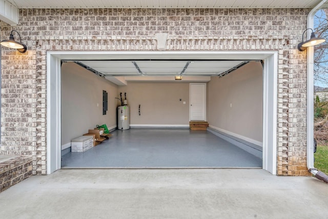 garage featuring electric panel, electric water heater, and concrete driveway