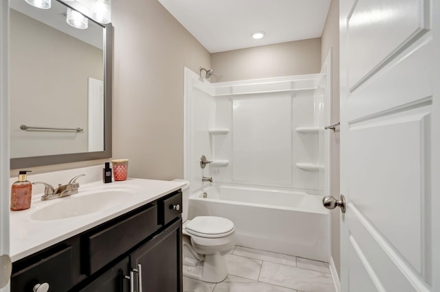 bathroom featuring vanity, toilet, washtub / shower combination, and marble finish floor