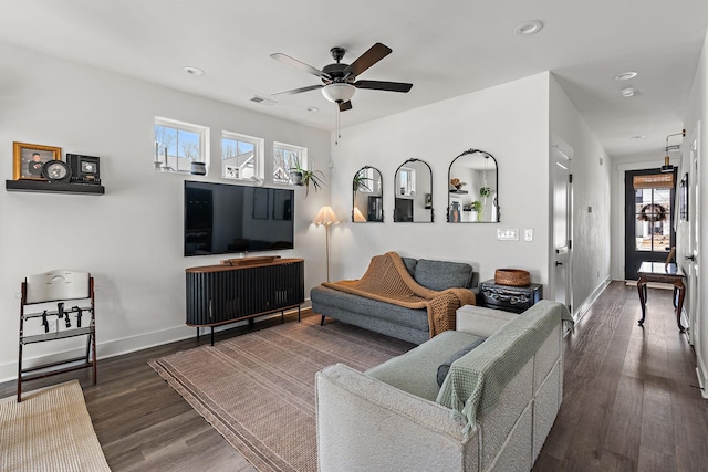 living area with a ceiling fan, baseboards, visible vents, recessed lighting, and dark wood-type flooring