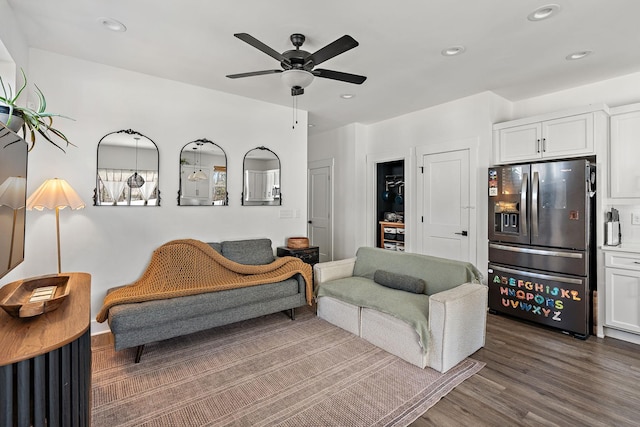 living room featuring ceiling fan, wood finished floors, and recessed lighting