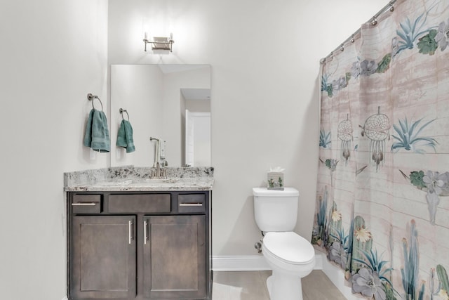 full bath featuring a shower with curtain, toilet, vanity, and tile patterned flooring