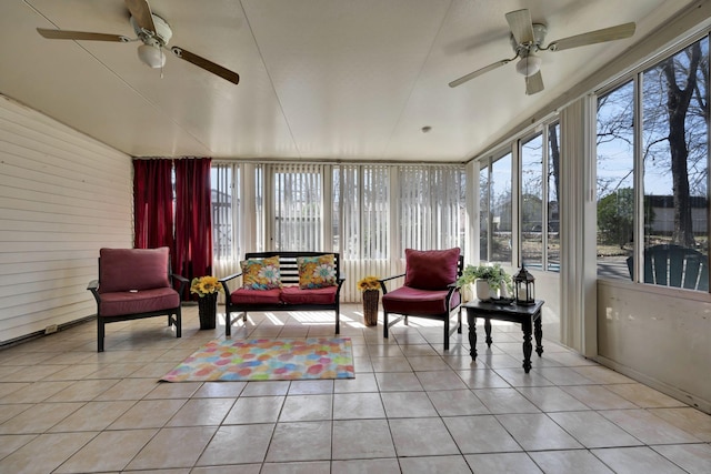 sunroom / solarium with ceiling fan