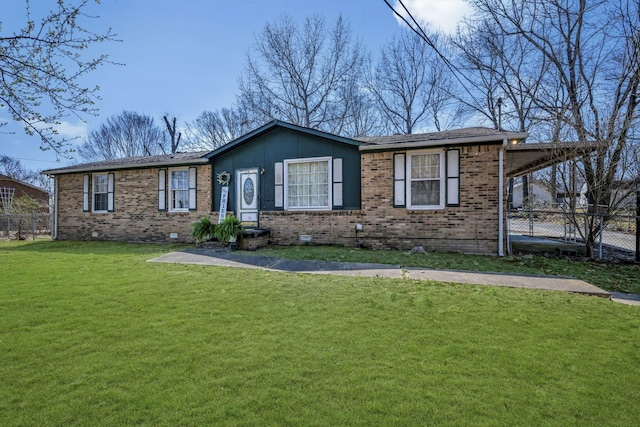 single story home with brick siding, a front yard, and fence