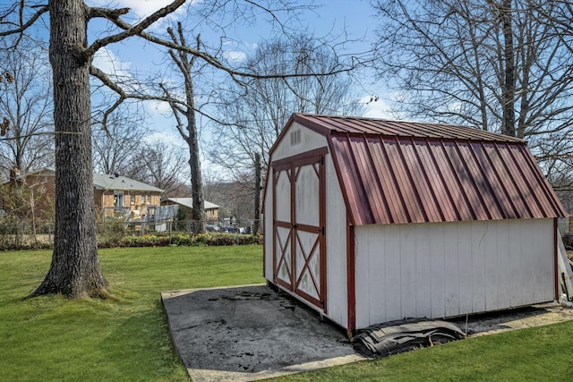 view of shed with fence