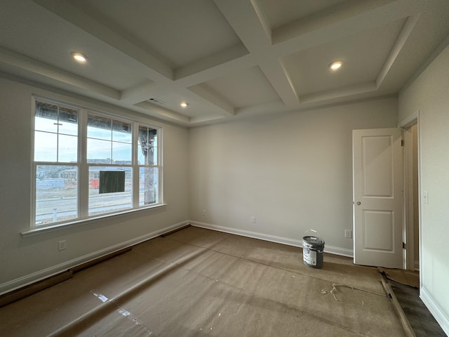 empty room with beam ceiling, recessed lighting, baseboards, and coffered ceiling