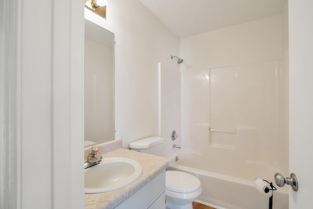 full bathroom featuring toilet,  shower combination, and vanity