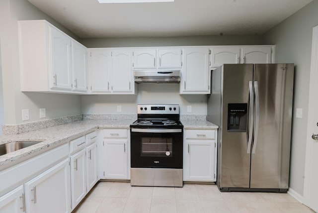 kitchen with white cabinetry, light stone countertops, under cabinet range hood, and stainless steel appliances