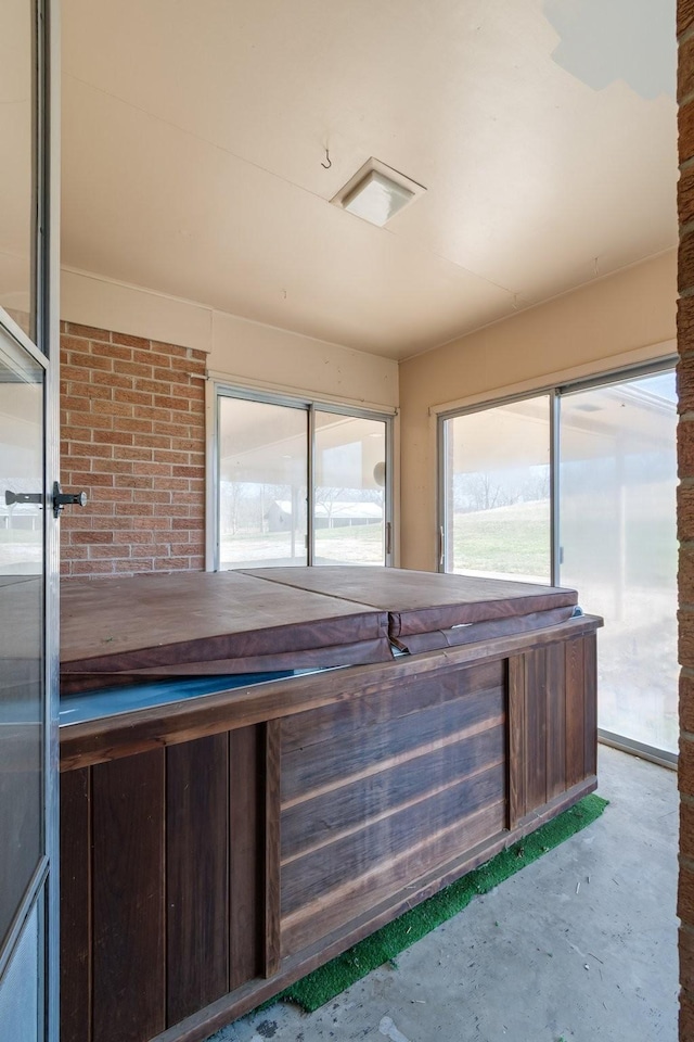 kitchen featuring unfinished concrete floors