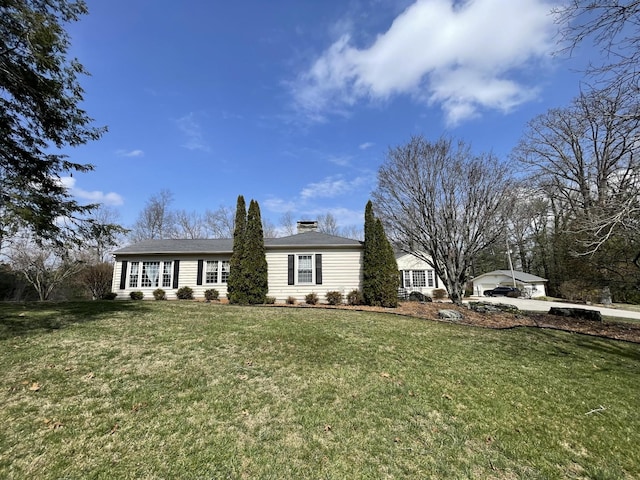 view of front facade with a front lawn