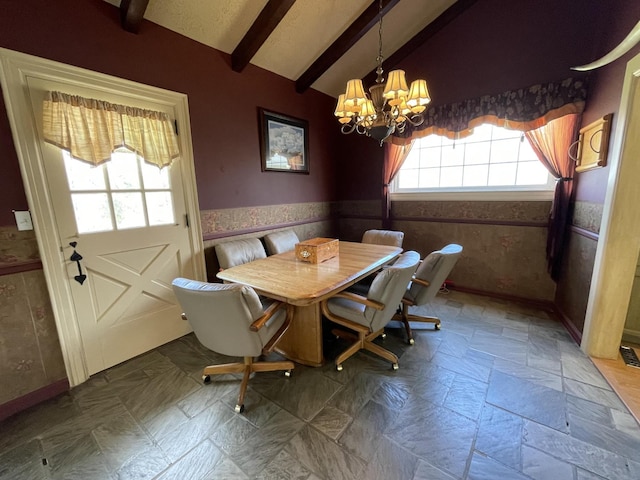 unfurnished dining area with vaulted ceiling with beams, a chandelier, and wainscoting