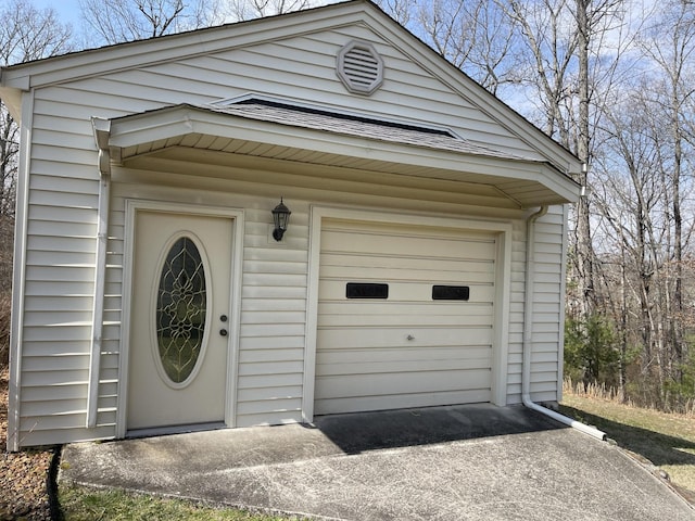 exterior space featuring concrete driveway