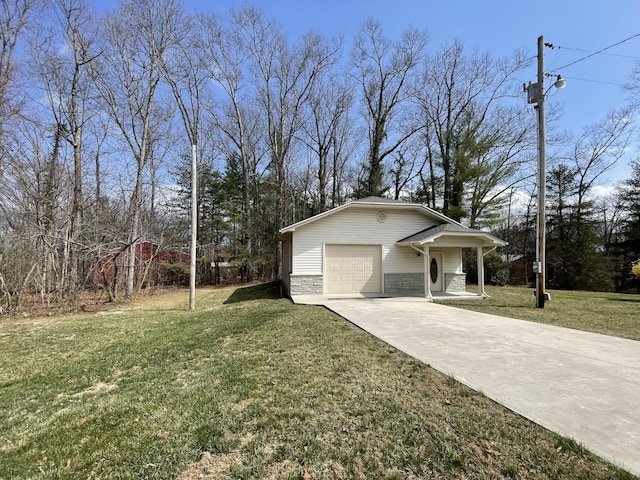 exterior space with driveway, an attached garage, and a front yard