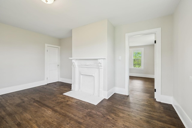 57 Young Branch Rd, Dixon Springs, TN 37057 - unfurnished living room featuring wood finished floors and baseboards