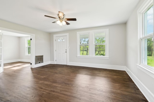 57 Young Branch Rd, Dixon Springs, TN 37057 - foyer with dark wood-type flooring, ceiling fan, baseboards, and heating unit