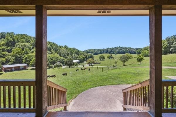 1650 Tarpley Shop Rd, Pulaski, TN 38478 - exterior space with visible vents and a rural view