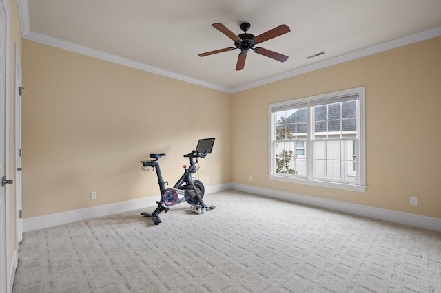 exercise area featuring visible vents, carpet flooring, and crown molding