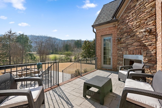view of patio featuring fence