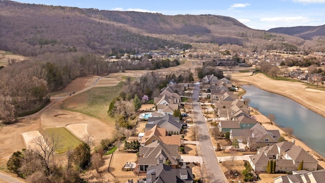 drone / aerial view with a residential view and a water and mountain view