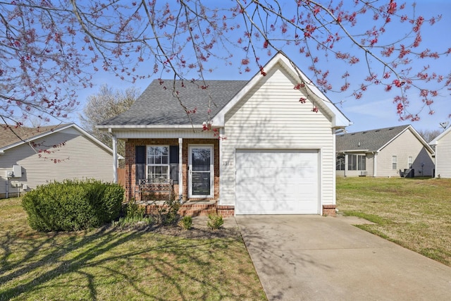 view of front of house with a front yard, a shingled roof, concrete driveway, a garage, and brick siding