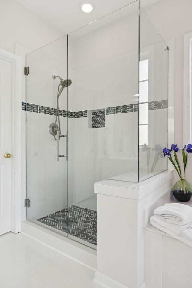 bathroom featuring a stall shower