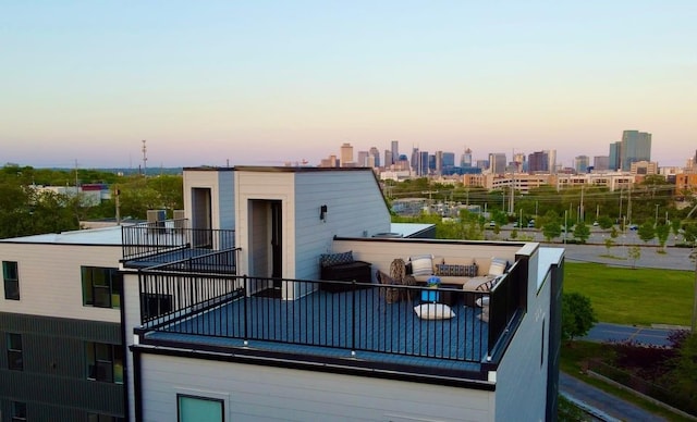 exterior space featuring a view of city and central AC unit