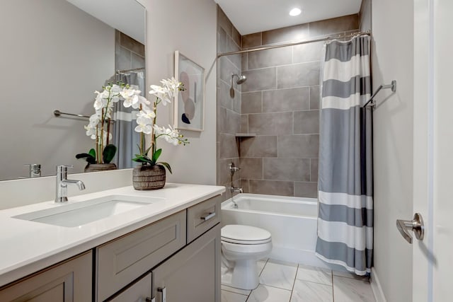 bathroom featuring shower / bathtub combination with curtain, toilet, and vanity