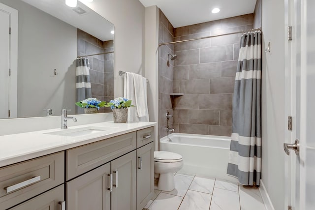 bathroom featuring visible vents, toilet, vanity, and shower / bath combo