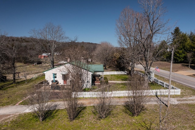 view of property's community with a fenced front yard