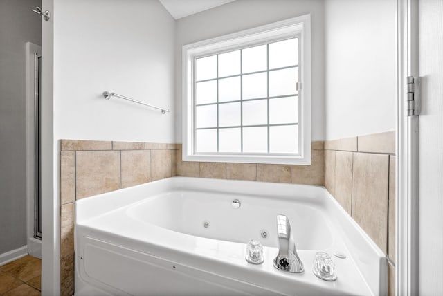 bathroom featuring a jetted tub