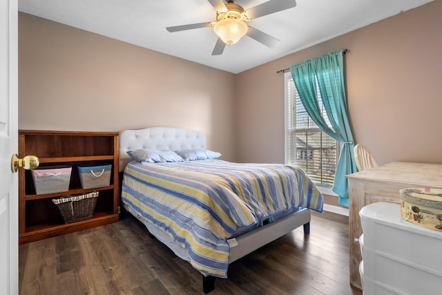 bedroom featuring a ceiling fan and wood finished floors