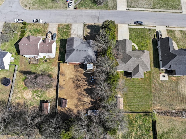 birds eye view of property with a residential view