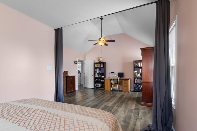 bedroom featuring dark wood-type flooring and vaulted ceiling